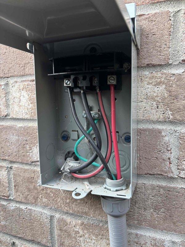 Completed scheduled HVAC maintenance tune-up on residential heat pump system. Performed comprehensive system inspection including electrical testing at outdoor disconnect box, verified proper voltage readings at 47.1V using calibrated multimeter, inspected all wire connections and terminal blocks for secure fastening, and evaluated outdoor unit components including condenser coil condition and cabinet integrity. All electrical connections found properly secured with no loose terminals, outdoor disconnect box operational and in functional condition, and heat exchanger fins showing normal wear patterns. System operating within manufacturer specifications with no service issues identified during maintenance visit.