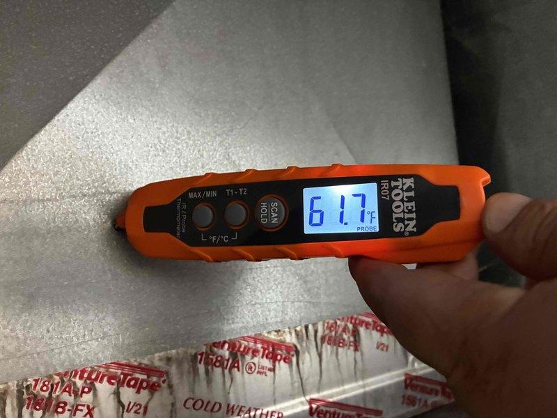 Responded to no cooling complaint on 3-year-old residential AC system with inadequate temperature output (66°F supply air versus expected 55°F). Upon arrival, performed diagnostic testing using digital clamp meter and infrared thermometer to measure electrical parameters and temperature differentials at the outdoor condensing unit. Verified system operation, recorded amperage draws, and documented supply air temperatures to identify cooling deficiency affecting the entire home.