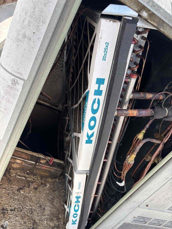 Performed comprehensive inspection of 6-7 rooftop units including makeup air system at commercial facility. Cleared clogged condensate drain line on unit located at rear of building near Walmart. Documented filter sizes for all systems to facilitate future filter replacement service.