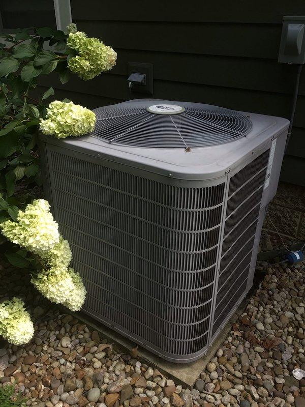 Completed scheduled air conditioning maintenance tune-up on residential cooling system. Performed comprehensive inspection of outdoor condensing unit, verified proper operation of digital thermostat set at 70 degrees, and documented system condition with photographic records. All components found operating within normal parameters with no immediate service needs identified.