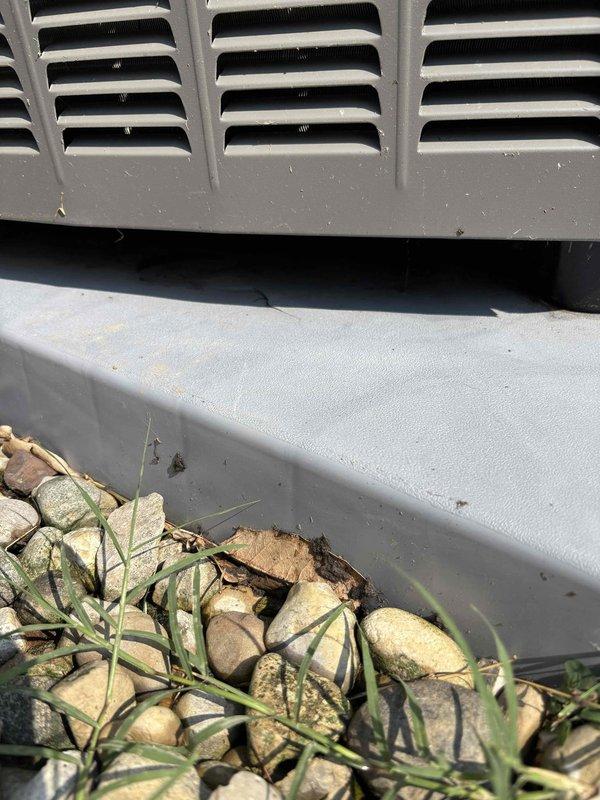 Completed annual planned maintenance on one-year-old HVAC system during second visit. Performed standard maintenance procedures, inspected outdoor condenser unit on concrete pad, and noted active zoning pressure switch notification (high pressure) on system's digital control interface requiring further evaluation.