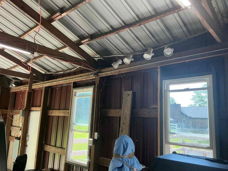 Responded to service call for stove outlet wiring issue where a four-prong receptacle was installed with only three wires present, creating an improper and potentially unsafe electrical connection. Assessed barn structure currently being used for canning operations and evaluated feasibility of installing additional four-prong outlet to accommodate stove requirements. Documented existing electrical infrastructure and provided recommendations for proper four-wire circuit installation to meet current NEC standards for range/stove connections.