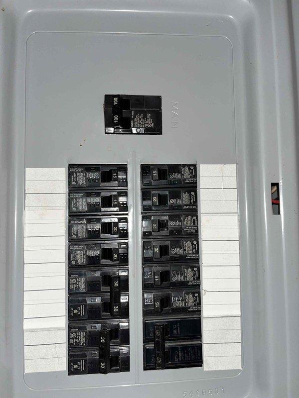 Conducted comprehensive replacement estimate at rental property for existing member whose current HVAC system is non-operational. Performed detailed load calculations using EDS software, determining cooling load requirements of 25,983 BTU and heating load requirements of 33,687 BTU based on structure characteristics including duct loss, ceiling, glass, wall, infiltration, and floor factors. Documented existing electrical panel configuration showing circuit breaker arrangement and confirmed adequate electrical infrastructure for replacement equipment installation.