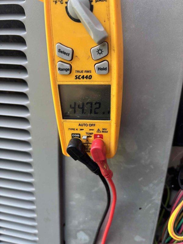 Completed Platinum Level planned maintenance on a 4-year-old HVAC system during first service visit. Performed comprehensive inspection of vertically-mounted air handler unit, examining evaporator coil, heat exchanger assembly, and electrical components. Verified system operation using digital multimeter for temperature and electrical diagnostics, documenting readings of internal components. Replaced 20x20x5 air filter and inspected condensate drain system, brass fittings, and control board connections to ensure proper system performance.