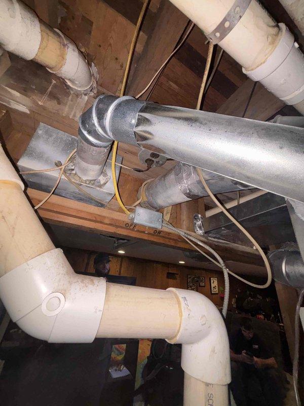 Completed installation of new air conditioning system including evaporator coil and ductwork modifications in residential attic space. Installed reflective insulated ductwork with proper routing and connections, integrated new metallic supply ducts with appropriate elbow fittings for optimal airflow distribution, and ensured all components were properly secured and sealed. System was tested for proper operation and airflow efficiency upon completion.