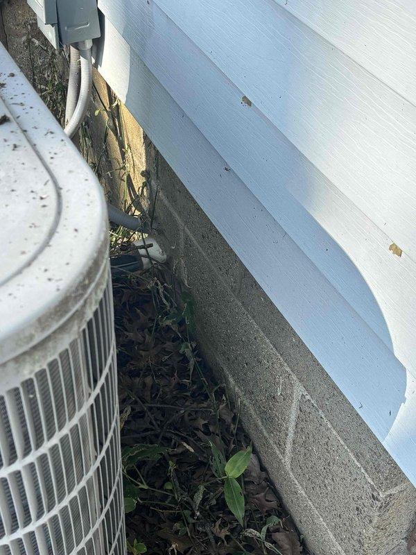 Conducted site assessment for outdoor HVAC condenser unit requiring elevation adjustment due to planned yard grading work. Documented current installation positioning, clearances, and connection points including refrigerant lines and electrical service to prepare estimate for unit relocation and/or raising to accommodate increased ground level from landscaping modifications.