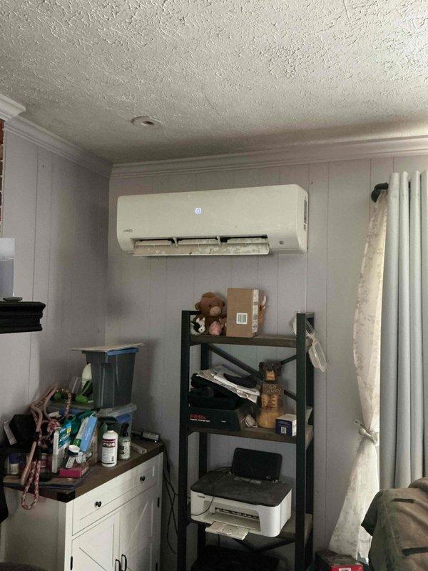 Responded to no cooling complaint on ductless mini-split system less than 10 years old. Diagnosed failed blower motor preventing air circulation and identified two defective iWave Mini air purification units requiring replacement. Submitted warranty parts request for blower motor and both iWave Mini units with estimated 2-hour repair time upon parts arrival.