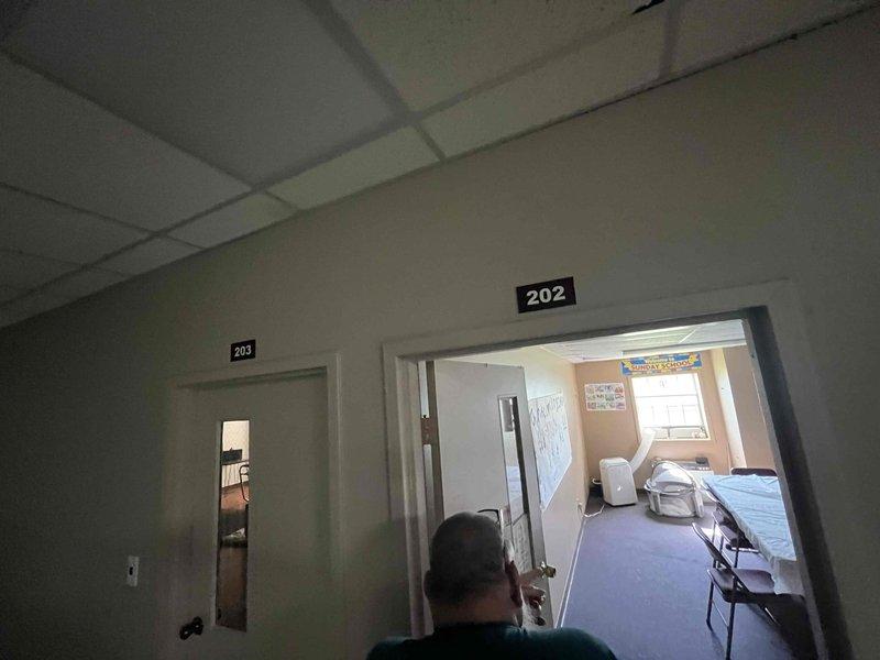 Conducted on-site evaluation for HVAC replacement in a multi-room facility with existing wall-mounted units showing signs of wall staining and age-related deterioration. Measured and assessed two separate room locations (rooms 202 and 203) to provide equipment replacement options, specifically evaluating feasibility for either PTAC unit replacement or multi-head mini-split system installation. Documented existing unit dimensions, electrical connections, and spatial constraints to develop comprehensive replacement proposal for the homeowner.