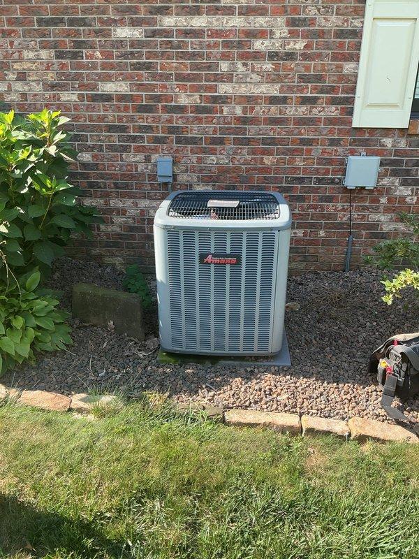 Completed Platinum Level Planned Duo Maintenance on two HVAC systems servicing the residence. Primary unit is a Goodman CAPF87A5C6DB central cooling air conditioner manufactured in 2012, utilizing R22/R410A refrigerant with 450 PSIG design pressure specifications. Secondary unit is an Amana outdoor condensing unit positioned on concrete pad with professional landscaping integration. 

Performed comprehensive maintenance protocol including inspection of both systems, replaced 20x25x4 air filter and polarized filter media, verified refrigerant charge levels, checked electrical connections at outdoor disconnect boxes, cleaned condenser coils, inspected drain pan operations, and confirmed proper system cycling. Both units demonstrated normal operational parameters upon completion of scheduled maintenance. All manufacturer specifications and safety standards were observed throughout service delivery.