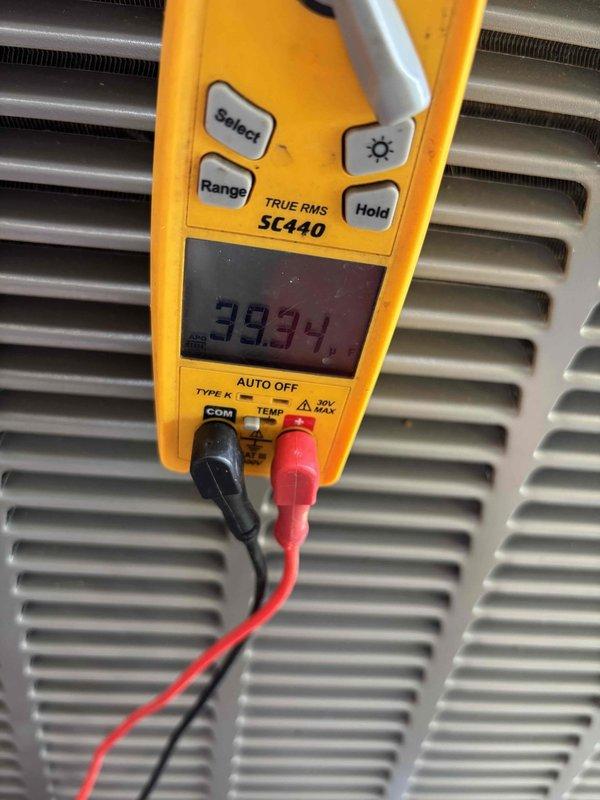 Completed planned maintenance visit on single-system residential HVAC unit with 16x25x1 filter configuration. Performed comprehensive system inspection including evaporator coil assessment, verified proper drainage function, and measured electrical parameters using digital multimeter, recording 39.94 volts at the unit. All components found operating within normal specifications, with coil showing appropriate condensation patterns indicating proper refrigerant cycle operation.