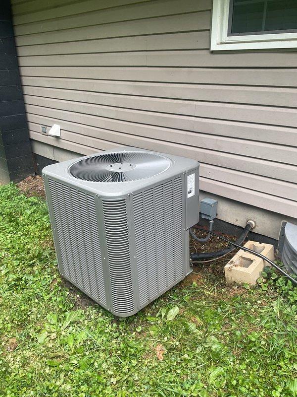 # Planned HVAC Maintenance Completed

Performed comprehensive planned maintenance on residential air conditioning system per scheduled campaign. Upon arrival, customer reported no operational issues or concerns with system performance.

Conducted complete AC tune-up service including visual inspection of outdoor condensing unit and indoor electrical control panel. Outdoor unit positioned on grade adjacent to structure showed normal operating condition with adequate clearance for airflow. Inspected electrical disconnect, condenser coil fins, and fan assembly. Verified unit is level and properly secured.

Accessed indoor air handler control panel to inspect electrical components and connections. Examined circuit breaker panel, control wiring, copper bus bar connections, and grounding systems. All electrical connections appeared secure with proper wire routing throughout enclosure. Verified foil-backed insulation integrity within cabinet. Inspected refrigerant line set penetrations and co