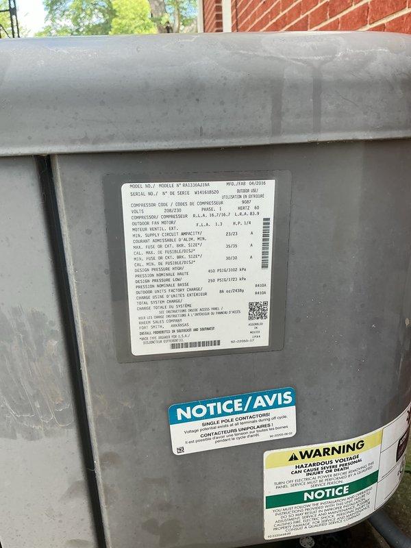 Conducted comprehensive on-site evaluation for complete HVAC system replacement. Documented existing equipment including outdoor condensing unit and indoor thermostat/control system. Photographed current system configuration, wiring connections at thermostat terminal blocks, and exterior unit specifications including model numbers, serial numbers, and electrical ratings. Provided customer with detailed replacement estimate for new high-efficiency system upgrade.