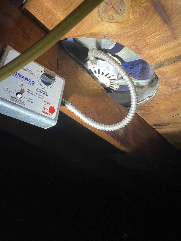 Replaced failed attic ventilation fan motor between ceiling joists, restoring proper attic exhaust function. Work was completed as part of previously approved HVAC system upgrade scope, with all electrical connections properly secured and tested for operation.