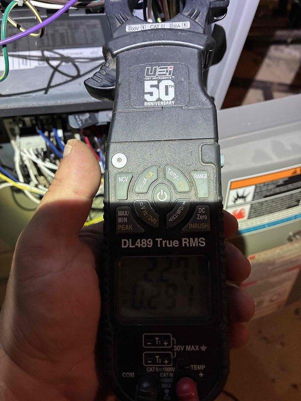 Completed scheduled AC tune-up and maintenance service on residential air conditioning system. Performed comprehensive system inspection, electrical diagnostics using digital multimeter to verify proper voltage and amperage readings at condensing unit, and documented equipment condition. Noted significant vegetation growth obstructing outdoor condensing unit airflow, which can reduce system efficiency and restrict proper heat exchange if not addressed.