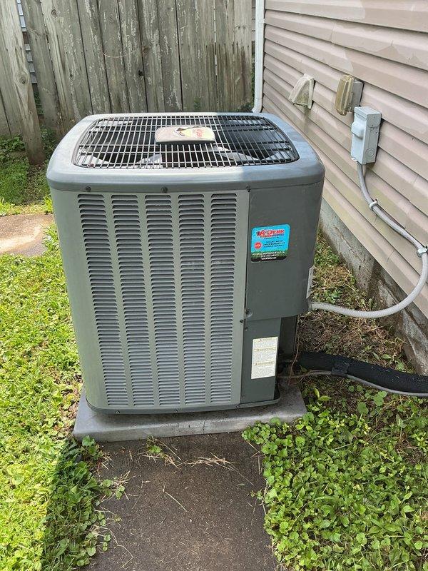 Completed scheduled AC tune-up and preventive maintenance on residential cooling system. Performed comprehensive inspection of outdoor condenser unit, verified proper operation of all components, checked refrigerant lines and electrical connections, and documented system temperatures with readings indicating normal operating parameters at 153°F. Unit found in satisfactory working condition with no immediate repairs required.