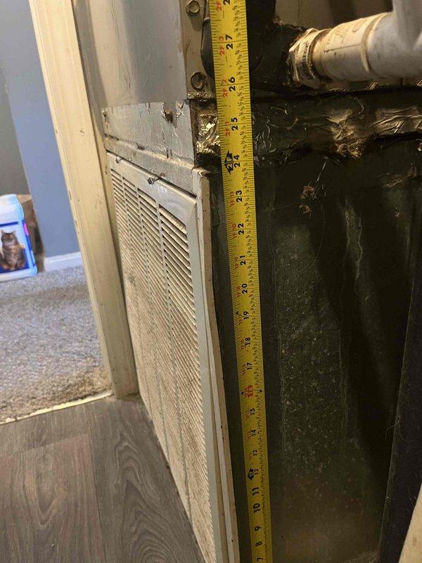 Conducted comprehensive replacement estimate for split HVAC system consisting of rooftop condensing unit and ground-level air handler. Accessed rooftop equipment via ladder to assess existing unit condition and specifications. Documented electrical service panel configuration and amperage capacity for system compatibility verification. Measured and photographed interior return air grille installation and existing air handler location to determine proper equipment sizing and clearance requirements. Evaluated ductwork connections and insulation condition on existing air handler assembly. Provided customer with equipment replacement options and specifications for complete system upgrade.
