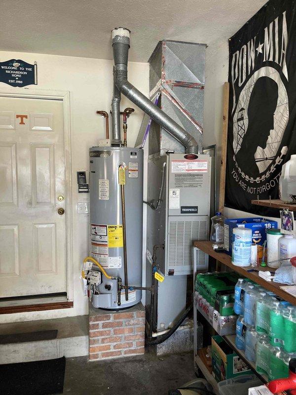 Responded to no cooling complaint on 10+ year old residential HVAC system with thermostat set to 73°F and indoor temperature at 77°F. Upon arrival, confirmed unit was running with airflow present but insufficient cooling, and drain line showed no condensation production. Performed diagnostic evaluation of system components including electrical panel, furnace assembly, and ductwork configuration. Identified cooling deficiency and provided customer with repair recommendations for the aging system to restore proper cooling capacity and condensate drainage.
