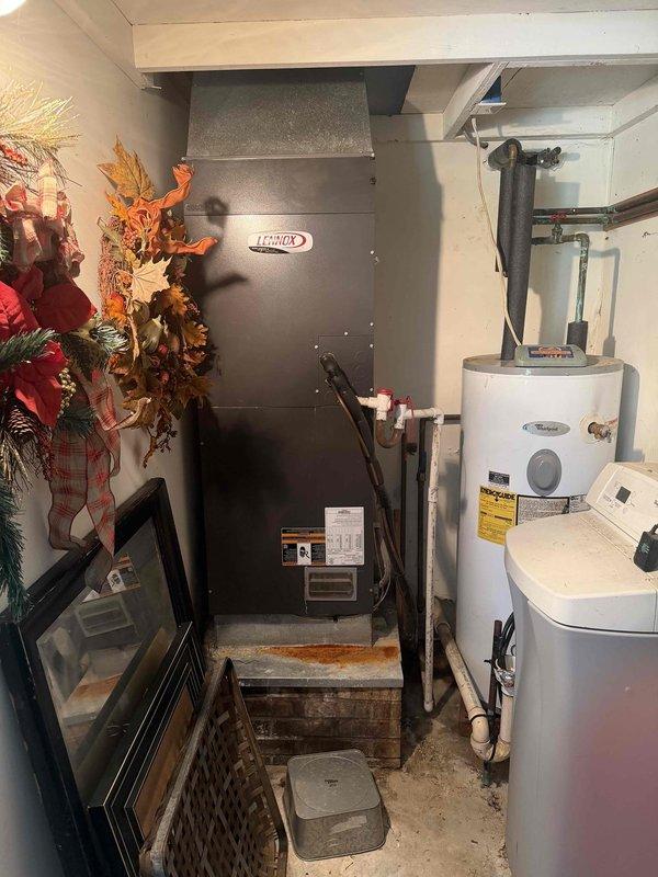 Responded to no cooling complaint on Lennox XP21-036-230-06 heat pump system. Diagnosed failed S40 control board preventing unit operation. Documented model and serial number information, confirmed HFC-410A refrigerant specifications, and photographed equipment nameplate for warranty part ordering with estimated 1-hour installation time upon part arrival.