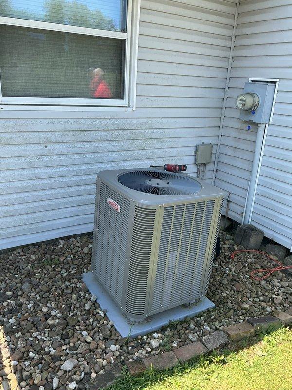 Completed scheduled preventative maintenance on residential Lennox split HVAC system. Performed comprehensive AC tune-up on outdoor condensing unit and indoor furnace/air handler located in utility closet. Inspected electrical connections at disconnect box, verified proper operation of condenser fan motor, checked refrigerant lines and insulation integrity, and evaluated overall system performance. Cleaned condenser coils, confirmed adequate clearance around outdoor unit, and tested system startup sequence. All components operating within normal parameters. System ready for continued service.