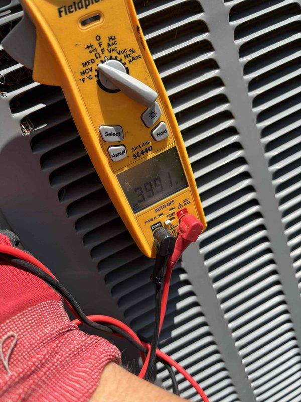 # HVAC Maintenance Summary

Completed second annual Platinum Level maintenance service on a 5-year-old HVAC system. Performed comprehensive inspection of outdoor condensing unit, including electrical component testing and capacitor evaluation using digital multimeter, which confirmed proper operating values at 33.04 MFD. Replaced 20x20x5 air filter, inspected all electrical connections and wiring, and verified system performance. All components operating within manufacturer specifications. System ready for continued service, with annual maintenance renewal due.