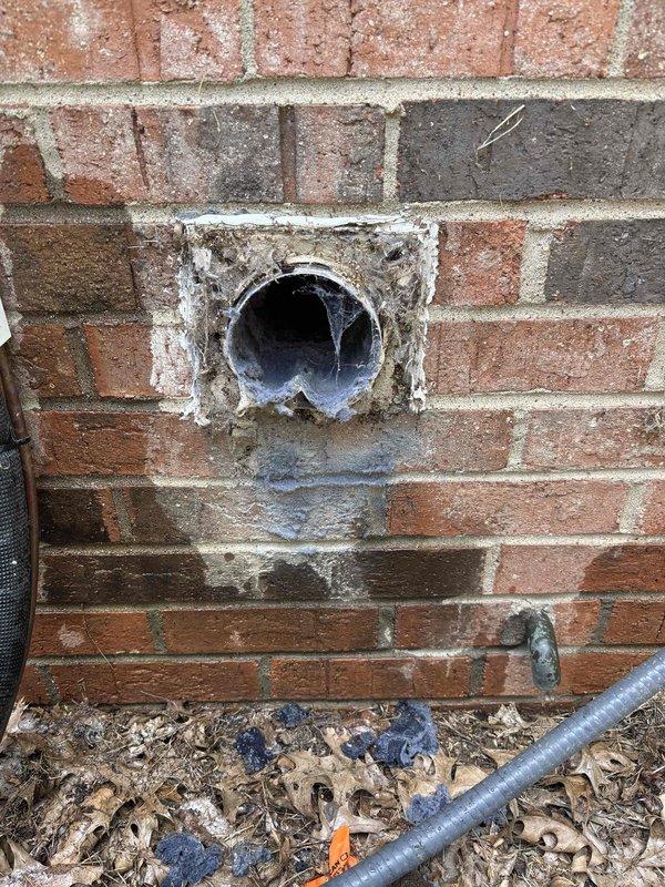 Completed monthly platinum-level maintenance on a 3-year-old HVAC system, including replacement of 16x25x5 filter, comprehensive system inspection, and electrical diagnostics using clamp meter to verify proper amperage and system performance. Documented exterior condensing unit condition showing weathered penetration through brick wall with deteriorated mortar and minor staining, and captured electrical readings at indoor air handler to confirm system operating within manufacturer specifications.