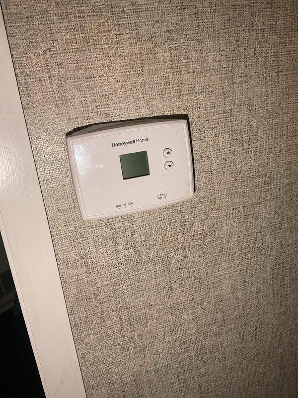 Responded to no cooling complaint on residential air conditioning system less than 10 years old. Upon arrival, performed visual inspection of outdoor condensing unit and indoor thermostat controls. Verified thermostat settings and operation of Honeywell Home digital control unit. Inspected outdoor condenser unit including electrical disconnect, conduit connections, and overall equipment condition. Unit mounted on exterior platform with proper clearances maintained. Conducted diagnostic assessment to identify cause of cooling failure and recommended appropriate corrective action to restore system operation.