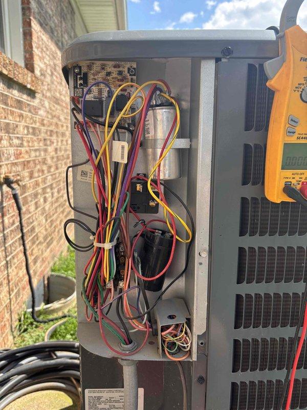 # HVAC Maintenance Summary

Completed annual Gold Level planned maintenance visit on a 5-year-old residential HVAC system. Performed comprehensive inspection of outdoor condensing unit, including electrical component testing with digital multimeter to verify proper capacitor function and electrical connections. Inspected indoor air handler with integrated Honeywell humidifier system, checking all mechanical components, ductwork connections, and operational controls. All equipment found operating within manufacturer specifications with no deficiencies noted. Documented system condition with photographic records for service history.