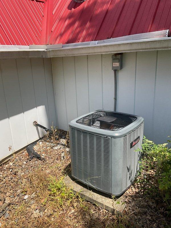 Conducted comprehensive replacement estimate for 23-year-old HVAC system experiencing water leakage issues. Evaluated existing outdoor condensing unit and indoor furnace installation, documented current equipment condition including corroded penetrations and aging refrigerant lines, and assessed structural considerations for new system installation. Provided homeowner with complete replacement options and specifications for new furnace and air conditioning system to address failing equipment.