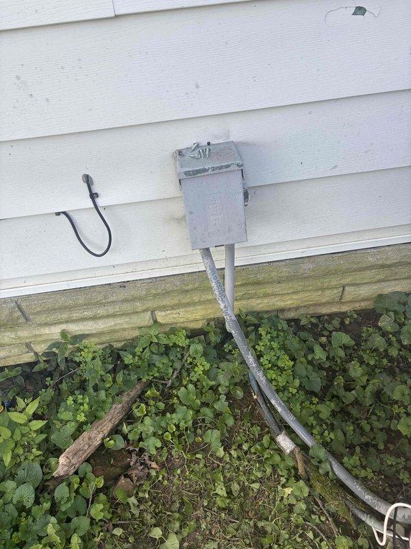 Responded to service call for failed HVAC system in 1872-built residential property with medium-sized heating and cooling requirements. Assessed 18-20 year old system with locked compressor in outdoor condensing unit. Inspected basement-installed natural gas/propane furnace and associated ductwork, noting age and condition of existing equipment. Documented existing HVAC infrastructure including furnace cabinet, duct connections, and exterior electrical disconnect. Provided comprehensive replacement estimate for complete system upgrade suitable for 1600-2200 square foot application with basement installation configuration.