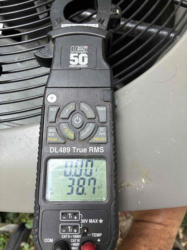 Completed scheduled AC tune-up and preventative maintenance on residential air conditioning system. Performed comprehensive system diagnostics including temperature differential measurements across supply and return grilles, recording 67°F supply air temperature and 38.7°F temperature reading at condensing unit. Conducted electrical current draw testing using digital clamp meter to verify compressor amperage within manufacturer specifications. Inspected all accessible components, confirmed proper system operation with no deficiencies noted, and documented findings with diagnostic photos for service records.