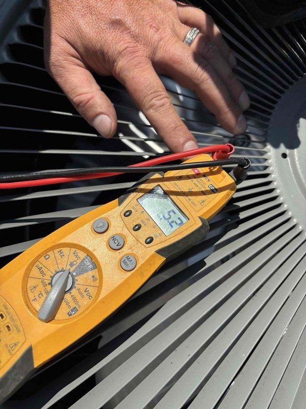Completed platinum-level preventive maintenance on one rooftop HVAC system approximately one year old. Accessed unit via ladder with two technicians, replaced 20x20x4 air filter, performed comprehensive system inspection including electrical testing with multimeter, verified all operational parameters, and documented equipment condition with photographs. System operating within normal specifications with no deficiencies noted.