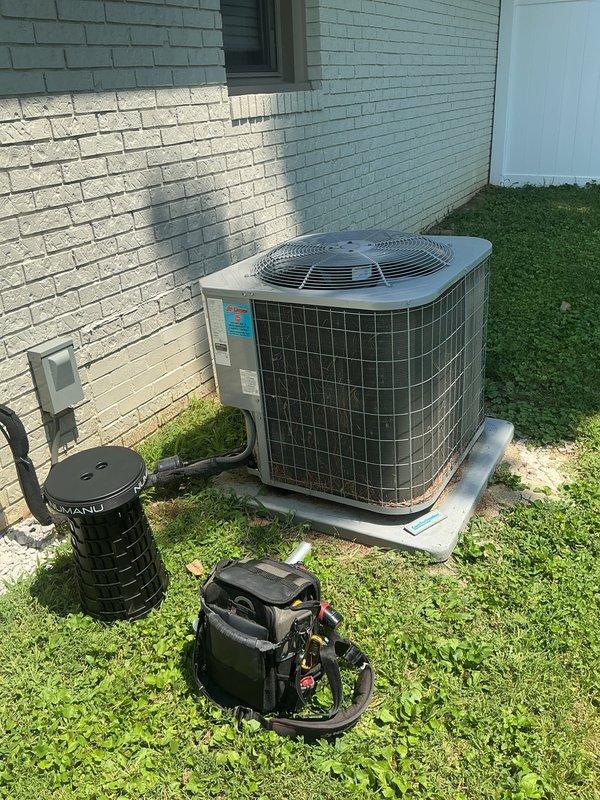 Responded to water leak complaint at residential property with 8-year-old Comfortmaker air handler system located in utility closet. Upon arrival, found active water dripping from condensate drain line with bucket placed underneath to collect discharge. Customer reported leak began previous day and continued even after shutting down air conditioning system to prevent condensation buildup. 

Performed diagnostic inspection of air handler unit and condensate drainage system. Inspected PVC condensate drain piping, drain pan, and associated plumbing components. Evaluated condensate pump operation and drain line routing. Checked for blockages in primary and secondary drain lines. Assessed air handler cabinet for proper seal and insulation to rule out external condensation issues.

Identified source of leak and cleared blockage from condensate drain system. Verified proper drainage flow and tested system operation. Confirmed no water damage occurred to surrounding areas or flooring. Document