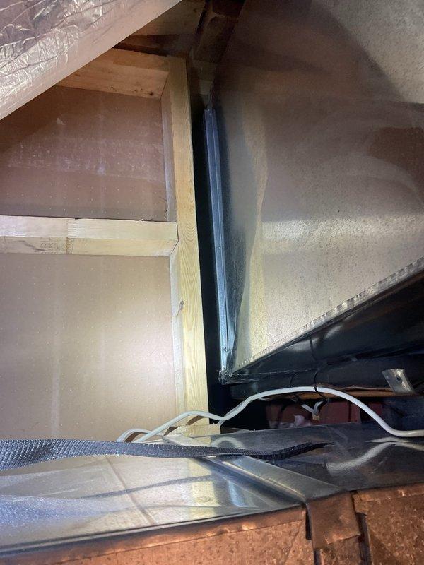 Completed scheduled AC tune-up and preventative maintenance on residential air conditioning system. Performed comprehensive inspection of multi-zone HVAC equipment including Honeywell zone control panel (HZ432) with all four zones operational and indicating proper function. Inspected ductwork installation in attic space, verified proper connections and securing of flexible and sheet metal ducts, and confirmed adequate insulation coverage throughout accessible areas.