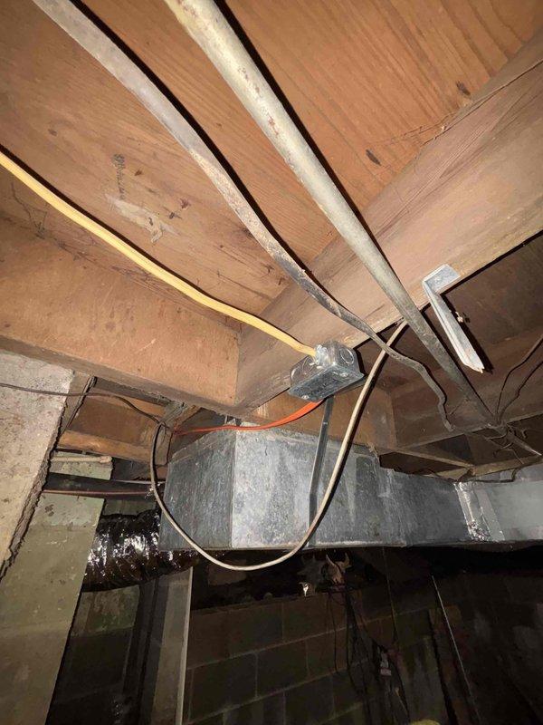 Completed full HVAC system installation including new furnace unit (Model ML196DFO7OXE488K-01) with LP conversion kit and comprehensive ductwork installation throughout the property. Installed new galvanized sheet metal rectangular ductwork in basement area with proper junction connections and flexible connector tubing to ensure optimal airflow distribution and system efficiency.