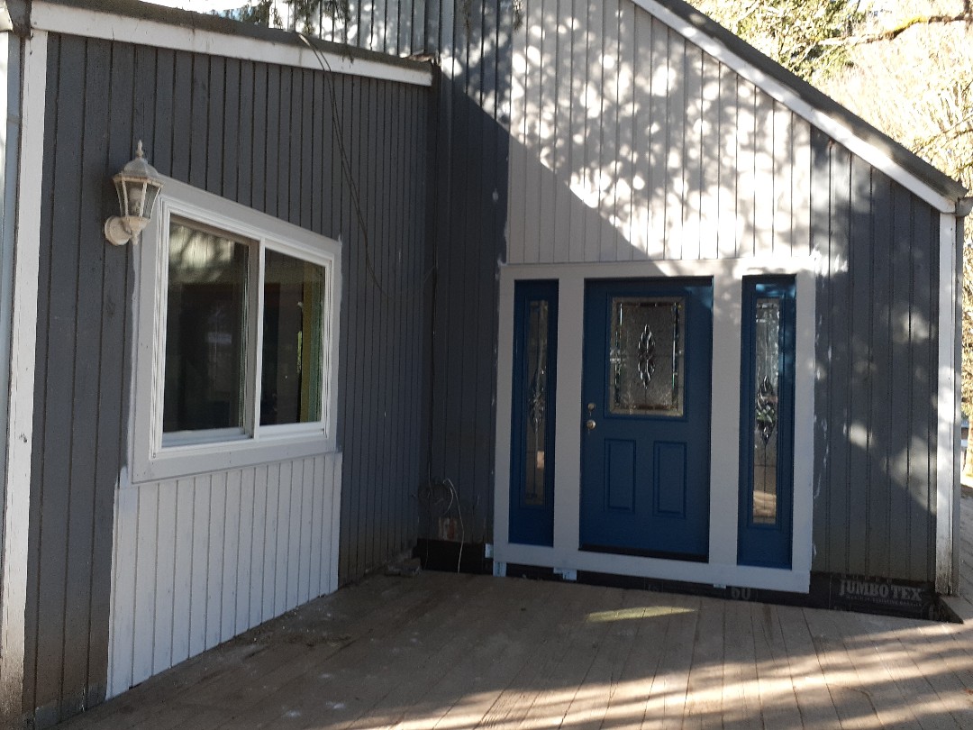 Just finished replacing 10 windows and a front door on this country house. Just finished replacing 10 windows and a front door on this country house.