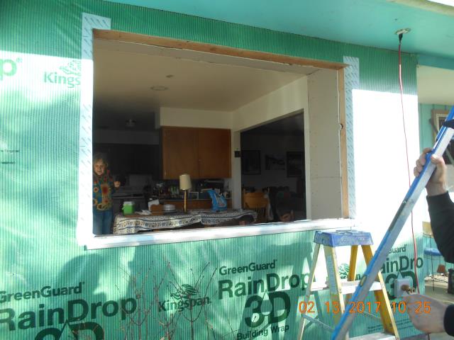 Albany, OR - Getting ready to install a large picture window. Albany, OR - Getting ready to install a large picture window.