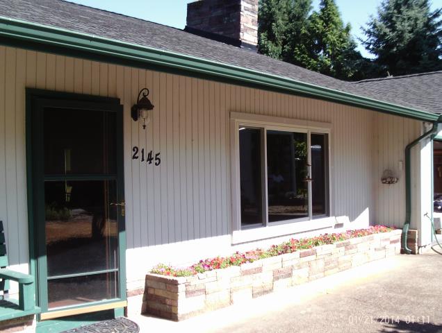 Corvallis, OR - 12 windows replaced and 2 sliding doors. Living room window changing to picture window, pine/white. Corvallis, OR - 12 windows replaced and 2 sliding doors. Living room window changing to picture window, pine/white.
