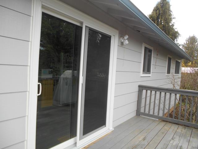 Oregon City, OR - Replaced front triple glider and 6 original aluminum, plus one patio door. White on white Oregon City, OR - Replaced front triple glider and 6 original aluminum, plus one patio door. White on white