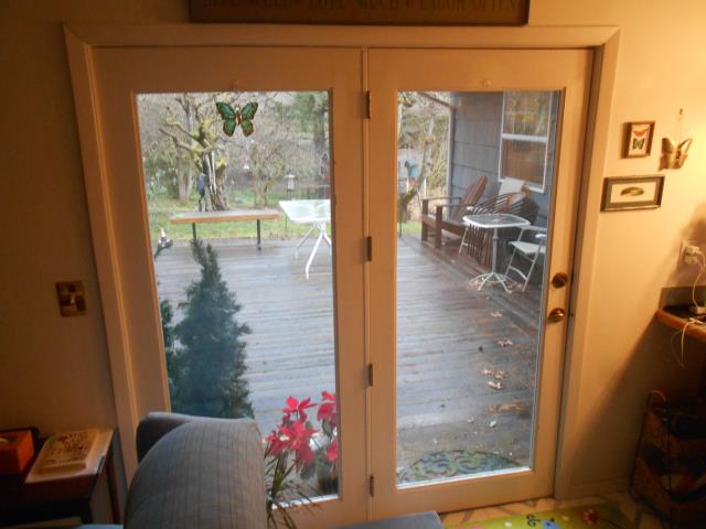 Oregon City, OR - Our professional installers put in a patio door and customized Fibrex window for this house! Oregon City, OR - Our professional installers put in a patio door and customized Fibrex window for this house!