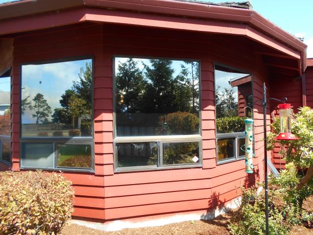 Seaside, OR - We replaced 9 windows with Andersen Fibrex materials and a patio door! Seaside, OR - We replaced 9 windows with Andersen Fibrex materials and a patio door!