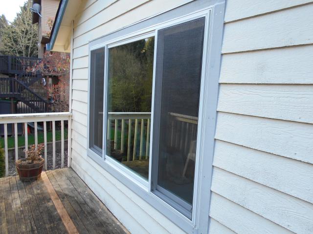 Aloha, OR - Our certified window installation crew put in 7 replacement windows from Renewal by Andersen including a sliding glass patio door replacement. Aloha, OR - Our certified window installation crew put in 7 replacement windows from Renewal by Andersen including a sliding glass patio door replacement.
