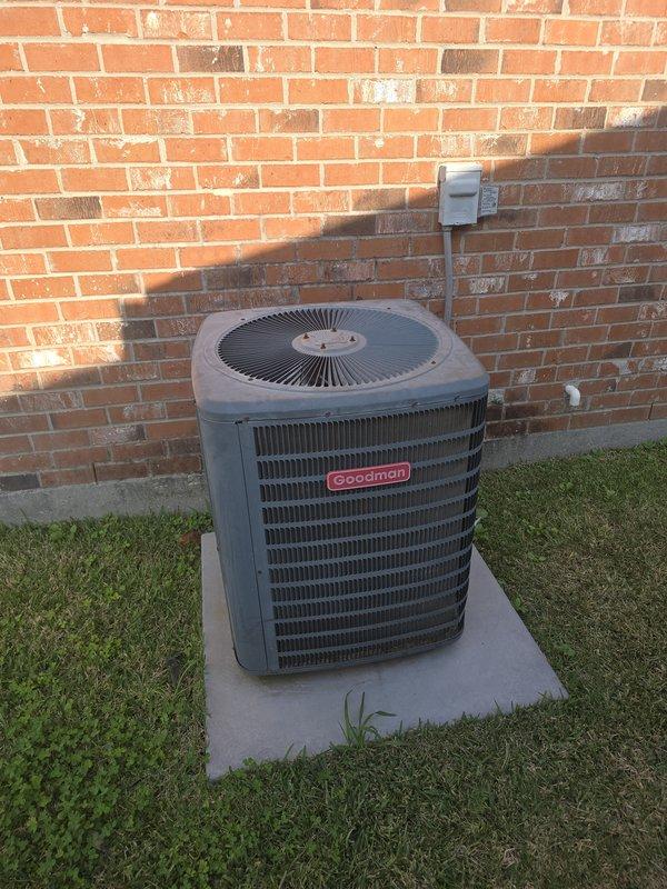 Completed installation of a new 2.5 ton Goodman HVAC system, including outdoor condensing unit mounted on concrete pad with proper electrical disconnect and horizontal air handler secured in attic with insulated ductwork. System is operational with 10-year parts and 2-year labor warranty.