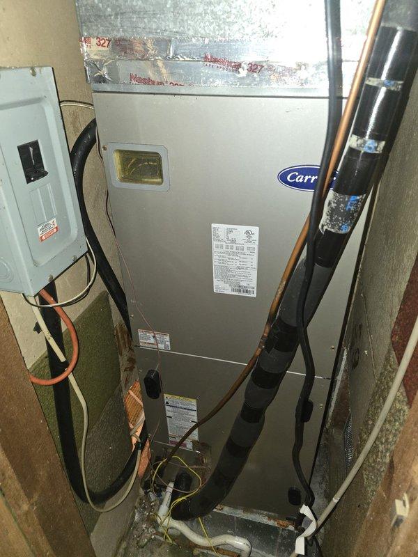 Diagnosed repeated circuit breaker trips on Carrier air handler system. Inspection revealed faulty wiring connection between disconnect panel and HVAC unit, with visible damage to orange conductor. Repaired compromised wiring and tested system through multiple cycles with no further breaker trips.