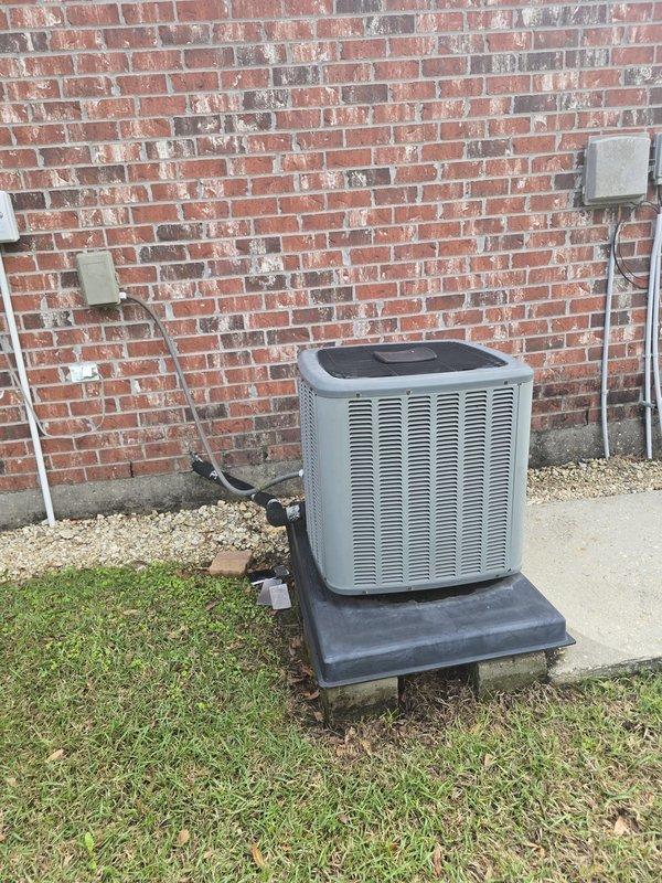 Completed estimate for a new HVAC system installation. Assessment included inspection of existing outdoor condenser unit (currently positioned against brick exterior wall with proper electrical connections) and evaluation of crawl space containing aging ductwork and air handler. Documented condition of current equipment and infrastructure to determine optimal replacement options.