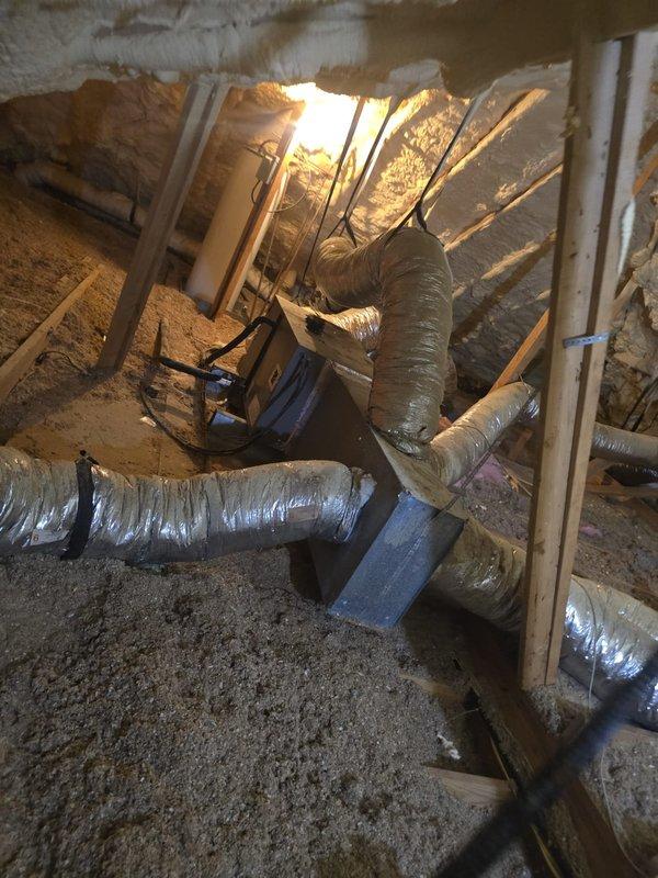 Completed estimate for a new HVAC system installation. Assessment included inspection of existing outdoor condenser unit (currently positioned against brick exterior wall with proper electrical connections) and evaluation of crawl space containing aging ductwork and air handler. Documented condition of current equipment and infrastructure to determine optimal replacement options.