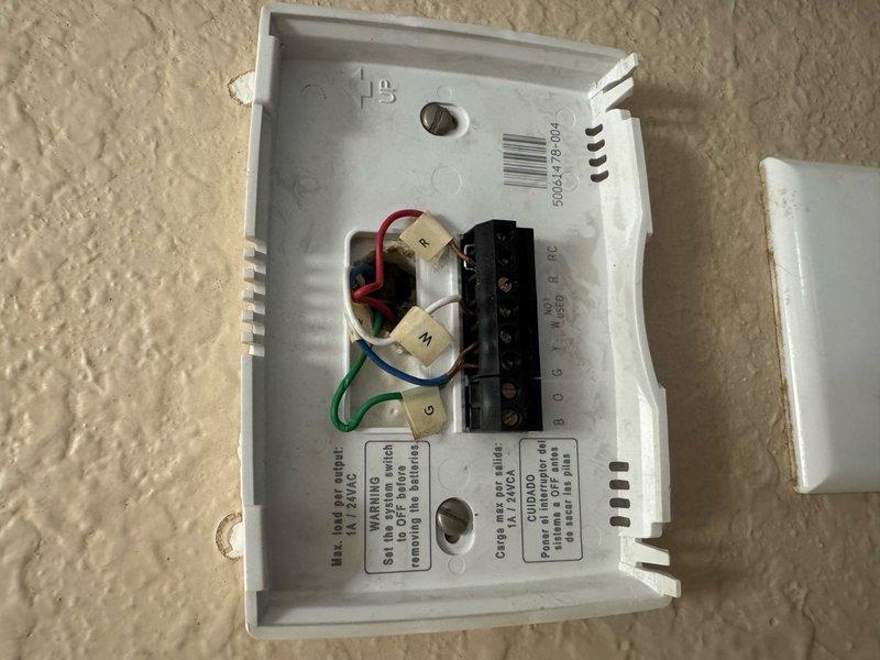 Performed spring maintenance service on HVAC system, including inspection and testing of thermostat wiring connections and electrical components. Conducted diagnostic measurements with multimeter showing 91.9 ohms reading, confirming proper operation of control circuitry. All connections were secured and system was verified to be functioning within manufacturer specifications.