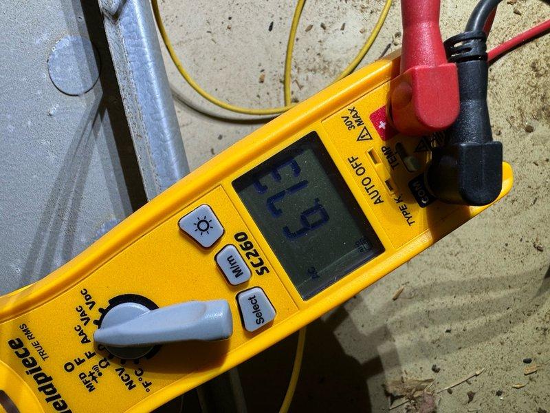 Performed spring maintenance service on HVAC system, including inspection and testing of thermostat wiring connections and electrical components. Conducted diagnostic measurements with multimeter showing 91.9 ohms reading, confirming proper operation of control circuitry. All connections were secured and system was verified to be functioning within manufacturer specifications.