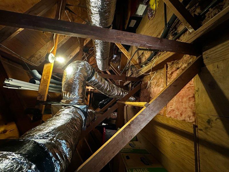 Completed installation of two supply drops and one return duct in attic space, ensuring proper airflow throughout the system. Adjusted and replaced registers to optimize air distribution and re-insulated suction line with appropriate materials. Conducted thorough airflow verification upon completion to confirm system performance meets specifications.