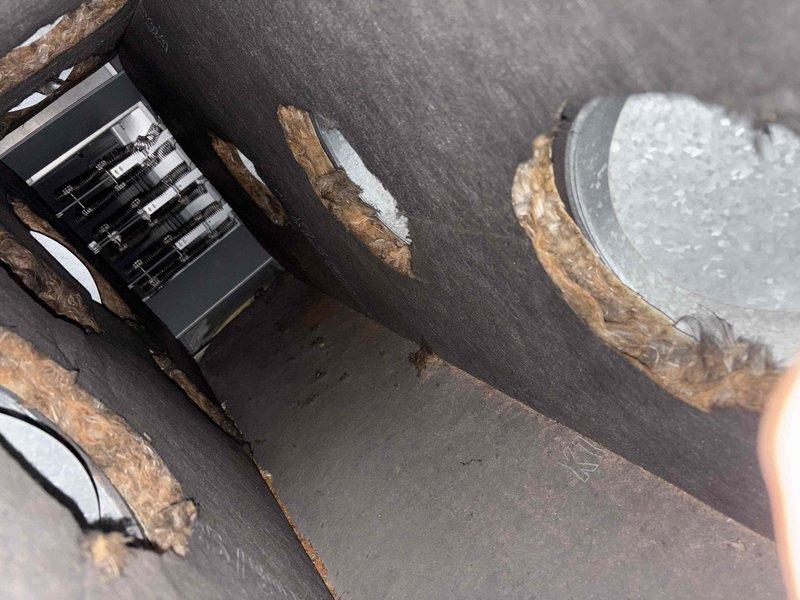 Completed spring maintenance on single HVAC system. Inspection revealed condensation accumulation on ductwork insulation and significant corrosion on metal support bracket within air handling unit, indicating potential moisture intrusion issues. Also observed foam insulation sealing around equipment penetrations and component openings. System evaluated for seasonal operation and proper function.