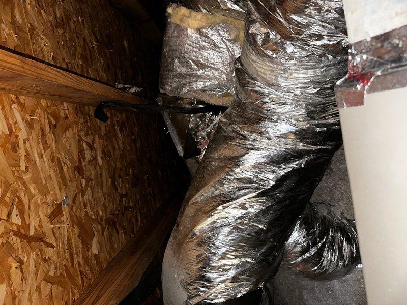 Installed twelve 8-inch stovepipe dampers on non-insulated wye fittings in attic HVAC system. Removed existing flexible ductwork connections, installed dampers at each wye location, reconnected flex ducting, and reinsulated all connections to restore proper system integrity and provide individual zone control.